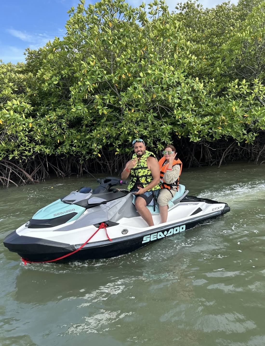 A couple on a Sea-Doo in the mangroves